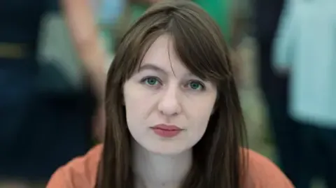 Irish author Sally Rooney declares she will not visit the UK because of arrest fears